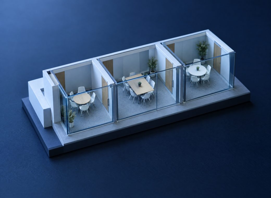 A model of small glass meeting rooms